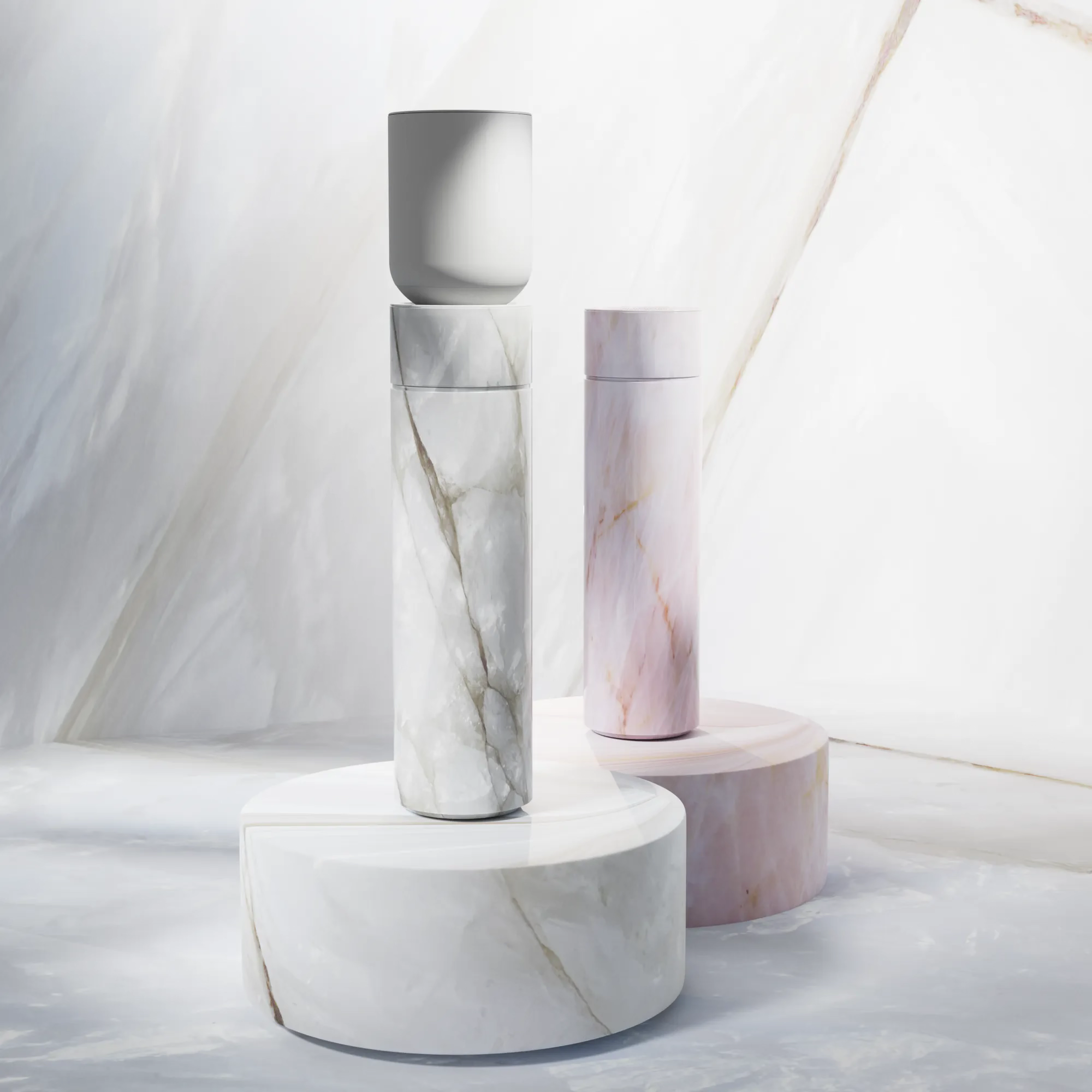 two speakers on marble blocks